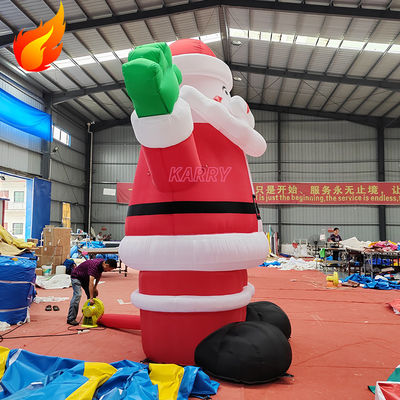 Heiße Weihnachtsfeier 4 Meter hoher Riesen aufblasbarer Weihnachtsmann mit tragbaren Funktionen