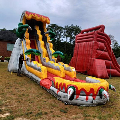 Große aufblasbare Rutschen für Erwachsene 36ft Spannendes Sprungspiel mit tropischem Dinosaurierthema