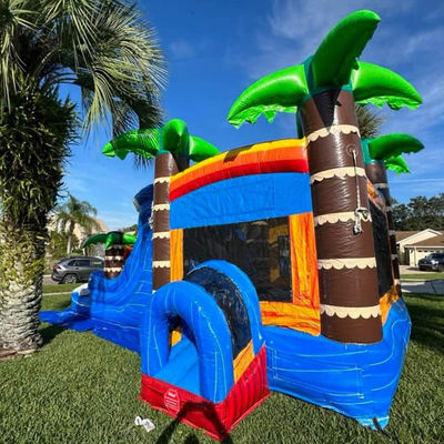 Kinder-Spielplatz aufblasbares Sprunghaus mit Schieberad und Palmenbaum