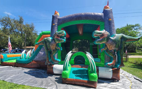 Jurassic Dinosaurs kommerzielles PVC aufblasbares Sprunghaus mit Schieberegler mit Blaser