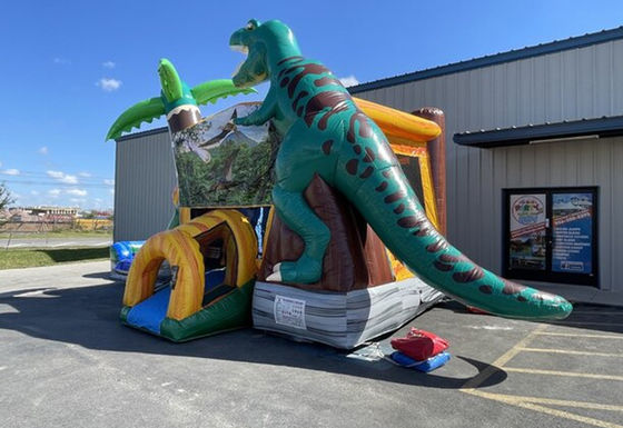 Erleben Sie den Nervenkitzel der Dinosaurierzeit mit unserem aufblasbaren Sprunghaus und unserer Rutsche