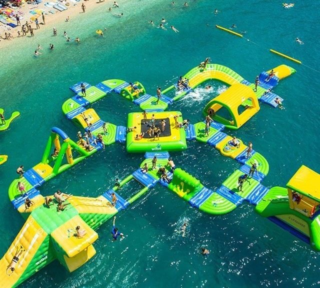 Unterhaltung Spaß Stadt maßgeschneiderter farbenfroher aufblasbarer Wasserpark für Kinder PVC-Material